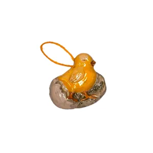 Pendente raffigurante un pulcino