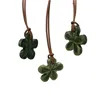Collana con ciondolo fioriforme smaltato verde smeraldo - foto 1